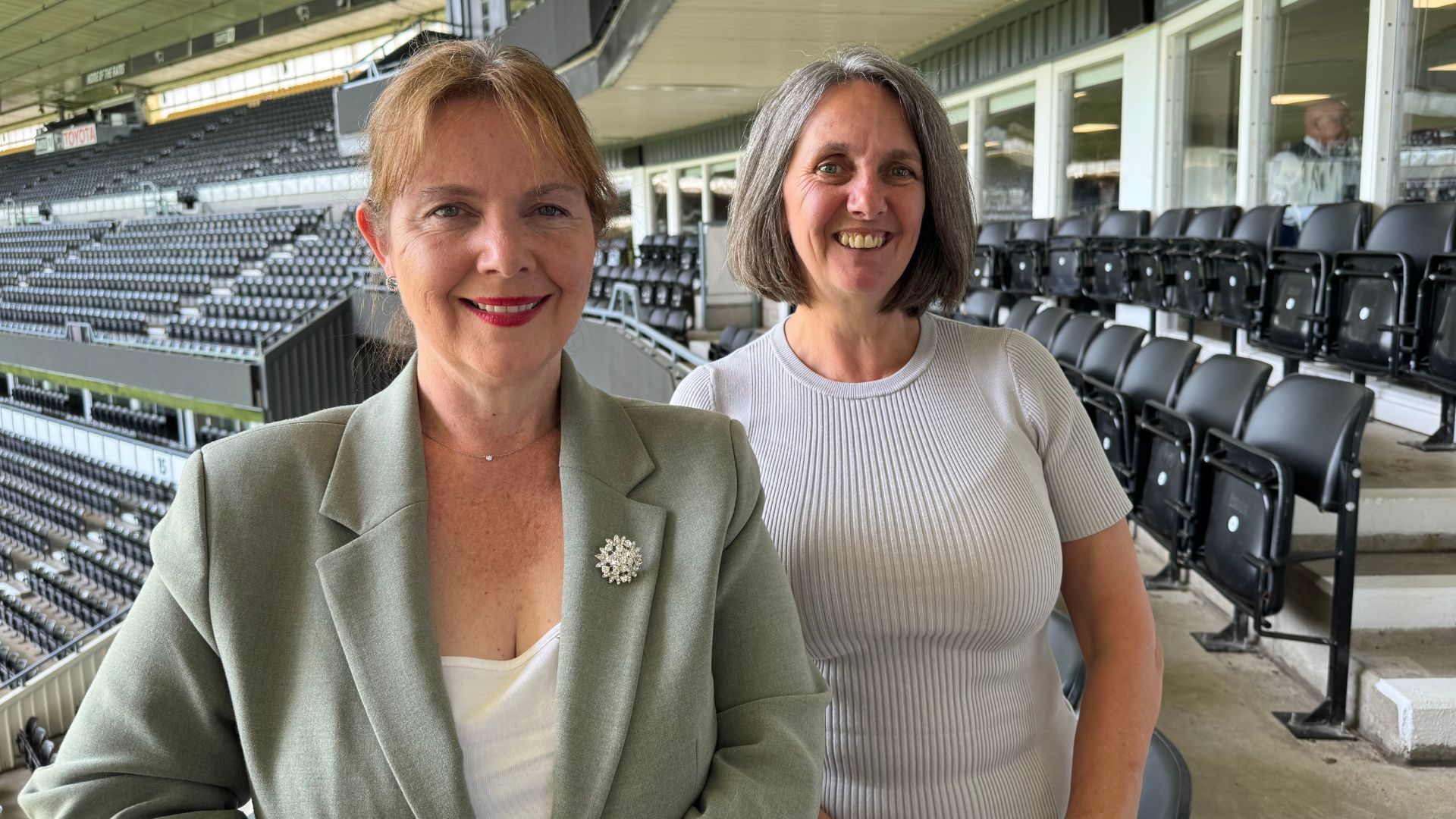 Kim with Claire Ward EMCCA announcement.jpg