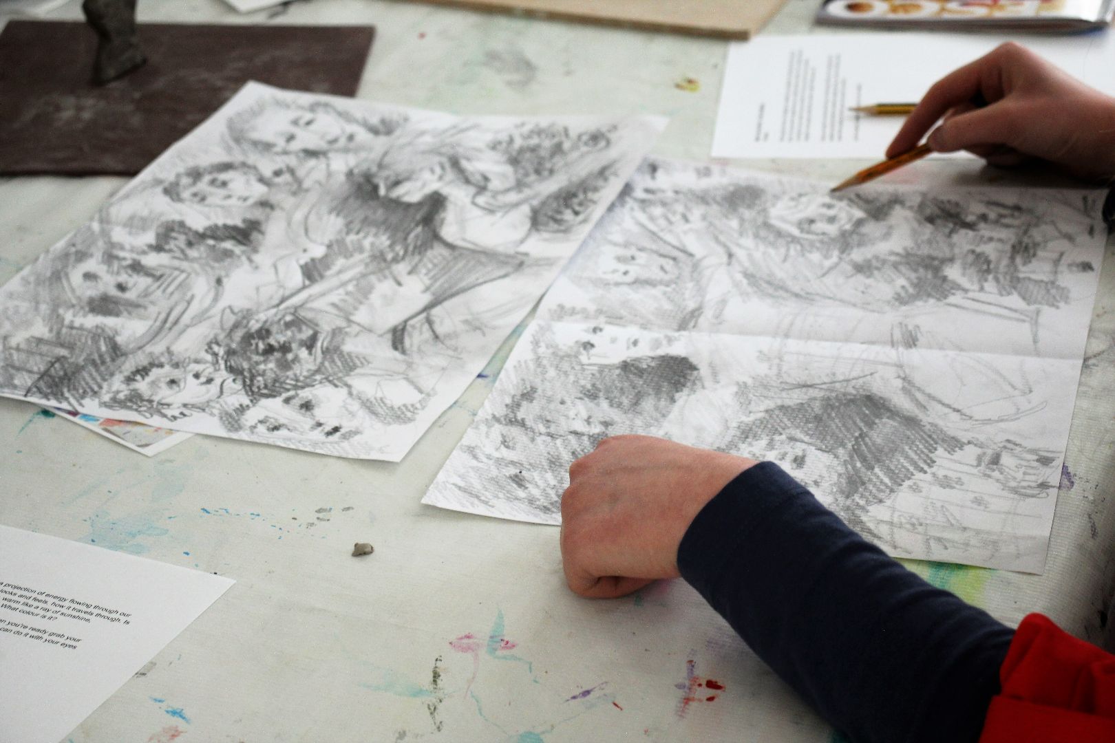 Photo of pencil sketches by YAC